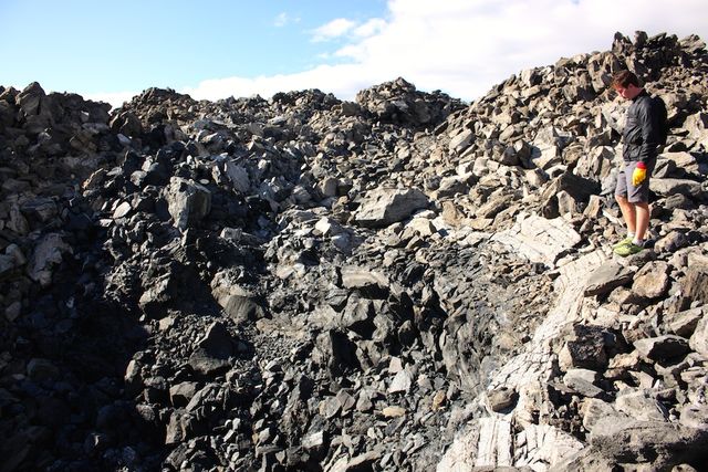 Josh studying explosion pits on Glass Mountain